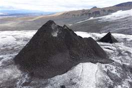 Education tour on the glacier Kverkjokull: Black ash accumulations