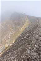 Tongariro Crossing: with strong wind, rain and fog